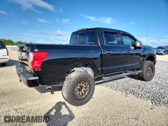 ✅ 2021 Nissan Titan SV • VIN: 1N6AA1ED7MN520365 • Lot: 80314305. Listed on Copart with 60,798 mi. Free auction sales archive from the USA and detailed vehicle history report at DreamBid. Image 3.
