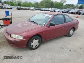 ✅ 1999 Mitsubishi Mirage DE • VIN: JA3AY11A9XU034689 • Lot: 51321805. Listed on Copart with 304,733 mi. Free auction sales archive from the USA and detailed vehicle history report at DreamBid. Image 1.