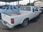 ✅ 1990 Toyota Pickup • VIN: JT4VN93D3L5007980 • Lot: 43633290. Listed on IAAI with 252,185 mi. Free auction sales archive from the USA and detailed vehicle history report at DreamBid. Image 4.