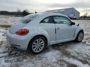 ✅ 2013 Volkswagen Beetle 2.0L TDI • VIN: 3VWRL7AT1DM645286 • Lot: 86223784. Listed on Copart with 82,479 mi. Free auction sales archive from the USA and detailed vehicle history report at DreamBid. Image 3.
