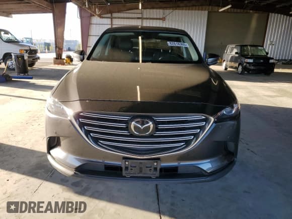 ✅ 2018 Mazda CX-9 Touring • VIN: JM3TCACY1J0233213 • Lot: 82618365. Wystawiony na Copart z przebiegiem 99 718 mil. Bezpłatny archiwum sprzedaży aukcyjnych z USA i szczegółowy raport historii pojazdu na DreamBid. Zdjęcie 5.