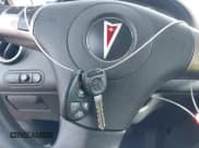 ✅ 2006 Pontiac G6 GT • VIN: 1G2ZH558564183588 • Lot: 42592824. Wystawiony na IAAI z przebiegiem 249 744 mil. Bezpłatny archiwum sprzedaży aukcyjnych z USA i szczegółowy raport historii pojazdu na DreamBid. Zdjęcie 11.