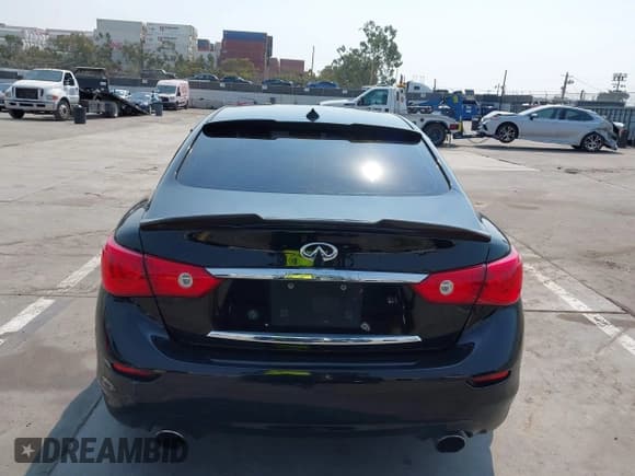 ✅ 2014 Infiniti Q50 • VIN: JN1BV7AP0EM678572 • Lot: 42828079. Listed on IAAI with 171,854 mi. Free auction sales archive from the USA and detailed vehicle history report at DreamBid. Image 16.