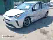 2021 Toyota Prius L Eco with VIN JTDKAMFU5M3137298, listed as a IAAI auction lot 42270937 with 38,828 mi miles and . Bid and sale history available at DreamBid. Image 2.