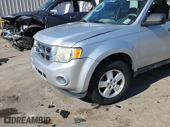 ✅ 2012 Ford Escape XLS • VIN: 1FMCU0C73CKA62765 • Lot: 91061745. Wystawiony na Copart z przebiegiem 102 825 mil. Bezpłatny archiwum sprzedaży aukcyjnych z USA i szczegółowy raport historii pojazdu na DreamBid. Zdjęcie 14.