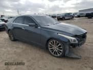 ✅ 2014 Cadillac CTS Luxury RWD • VIN: 1G6AR5SX7E0132961 • Lot: 52172885. Listed on Copart with 133,304 mi. Free auction sales archive from the USA and detailed vehicle history report at DreamBid. Image 4.