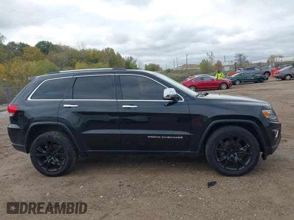 ✅ 2014 Jeep Grand Cherokee Limited • VIN: 1C4RJFBG2EC300033 • Lot: 43513085. Listed on IAAI with 209,315 mi. Free auction sales archive from the USA and detailed vehicle history report at DreamBid. Image 13.
