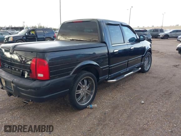 ✅ 2002 Lincoln Blackwood • VIN: 5LTEW05A02KJ01579 • Lot: 41408693. Listed on IAAI with Not provided. Free auction sales archive from the USA and detailed vehicle history report at DreamBid. Image 4.