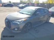 ✅ 2013 Hyundai Veloster Turbo • VIN: KMHTC6AE0DU083862 • Lot: 40600413. Wystawiony na IAAI z przebiegiem 92 875 mil. Bezpłatny archiwum sprzedaży aukcyjnych z USA i szczegółowy raport historii pojazdu na DreamBid. Zdjęcie 2.