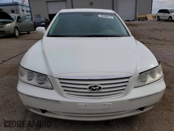 2006 Hyundai Azera SE с VIN KMHFC46F66A056611, выставлен на аукционе Copart как лот 55468615 с пробегом 138 582 миль миль и Списание • Salvage title. История ставок и продаж доступна на DreamBid. Изображение 5.