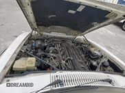 ✅ 1994 Jaguar XJS • VIN: SAJNX2749RC191243 • Lot: 76037994. Wystawiony na Copart z przebiegiem 74 842 mil. Bezpłatny archiwum sprzedaży aukcyjnych z USA i szczegółowy raport historii pojazdu na DreamBid. Zdjęcie 11.