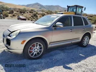 ✅ 2004 Porsche Cayenne Turbo • VIN: WP1AC29P14LA90088 • Lot: 67397604. Wystawiony na Copart z przebiegiem 193 324 mil. Bezpłatny archiwum sprzedaży aukcyjnych z USA i szczegółowy raport historii pojazdu na DreamBid. Zdjęcie 1.