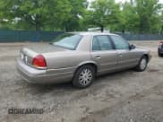 ✅ 2003 Ford Crown Victoria LX • VIN: 2FAHP74W33X103754 • Lot: 55881315. Listed on Copart with 132,368 mi. Free auction sales archive from the USA and detailed vehicle history report at DreamBid. Image 3.