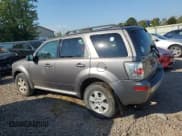 ✅ 2010 Mercury Mariner • VIN: 4M2CN9BG0AKJ07403 • Lot: 80071025. Listed on Copart with 128,074 mi. Free auction sales archive from the USA and detailed vehicle history report at DreamBid. Image 2.