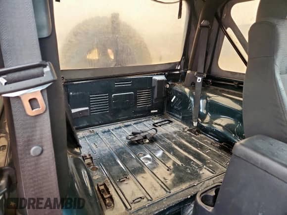 2005 Jeep Wrangler X с VIN 1J4FA39S35P333959, выставлен на аукционе Copart как лот 59576665 с пробегом 261 856 миль миль и Списание • Salvage title. История ставок и продаж доступна на DreamBid. Изображение 11.