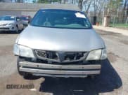 ✅ 2004 Pontiac Montana • VIN: 1GMDU03E94D189934 • Лот: 41968925. Опубликован ранее на IAAI с пробегом 143 411 миль. Бесплатный доступ к архиву аукционных продаж из США и подробный отчёт об истории автомобиля на DreamBid. Изображение 13.