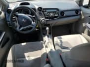 ✅ 2010 Honda Insight EX • VIN: JHMZE2H75AS003910 • Lot: 56485995. Listed on Copart with 104,685 mi. Free auction sales archive from the USA and detailed vehicle history report at DreamBid. Image 8.