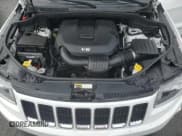 ✅ 2015 Jeep Grand Cherokee Limited • VIN: 1C4RJFBG0FC768764 • Lot: 61848825. Listed on Copart with 141,105 mi. Free auction sales archive from the USA and detailed vehicle history report at DreamBid. Image 12.