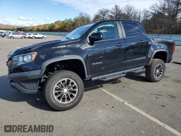 ✅ 2017 Chevrolet Colorado 4WD ZR2 • VIN: 1GCGTEEN6H1264594 • Лот: 76335084. Опубликован ранее на Copart с пробегом 63 012 миль. Бесплатный доступ к архиву аукционных продаж из США и подробный отчёт об истории автомобиля на DreamBid. Изображение 1.