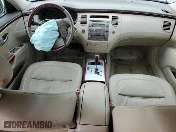 2007 Hyundai Azera SE с VIN KMHFC46F77A161661, выставлен на аукционе Copart как лот 47176065 с пробегом 230 314 миль миль и Списание • Salvage title. История ставок и продаж доступна на DreamBid. Изображение 8.