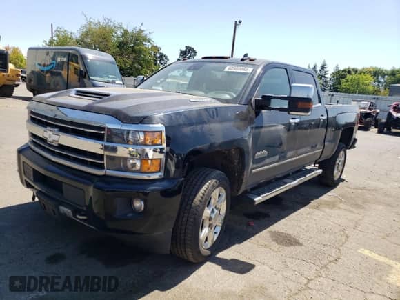 2018 Chevrolet Silverado 3500HD High Country с VIN 1GC4K1EY5JF153746, выставлен на аукционе Copart как лот 60980865 с пробегом Не указан миль и Списание • Salvage title. История ставок и продаж доступна на DreamBid. Изображение 1.
