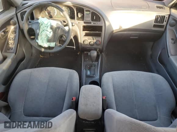 2004 Hyundai Elantra GLS z VIN KMHDN46D44U901502, wystawiony jako Copart lot #74850854 z przebiegiem 80 940 mil mil oraz Szkoda całkowita • Salvage title. Historia ofert i sprzedaży dostępna na DreamBid. Obrazek 8.