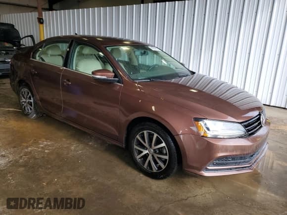 ✅ 2017 Volkswagen Jetta SE • VIN: 3VWB67AJ7HM322485 • Lot: 90549125. Listed on Copart with 79,734 mi. Free auction sales archive from the USA and detailed vehicle history report at DreamBid. Image 4.