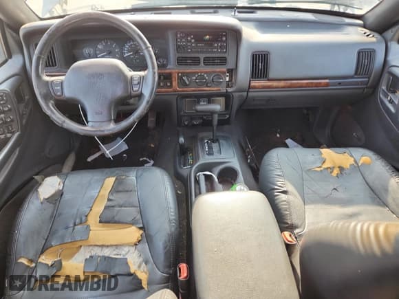 ✅ 1998 Jeep Grand Cherokee Laredo • VIN: 1J4GZ48S4WC338715 • Лот: 93702435. Опубликован ранее на Copart с пробегом 178 146 миль. Бесплатный доступ к архиву аукционных продаж из США и подробный отчёт об истории автомобиля на DreamBid. Изображение 8.