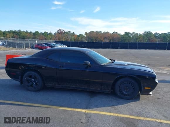 ✅ 2014 Dodge Challenger SXT • VIN: 2C3CDYAG7EH304459 • Lot: 43682366. Listed on IAAI with 197,016 mi. Free auction sales archive from the USA and detailed vehicle history report at DreamBid. Image 13.