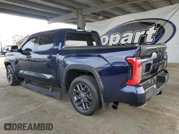 ✅ 2023 Toyota Tundra Platinum Hybrid • VIN: 5TFNC5DBXPX018545 • Lot: 91938865. Listed on Copart with 13,542 mi. Free auction sales archive from the USA and detailed vehicle history report at DreamBid. Image 2.