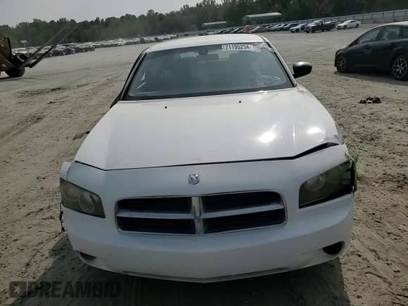 2007 Dodge Charger с VIN 2B3KA43R07H779155, выставлен на аукционе Copart как лот 71195234 с пробегом 251 044 миль миль и Списание • Salvage title. История ставок и продаж доступна на DreamBid. Изображение 11.