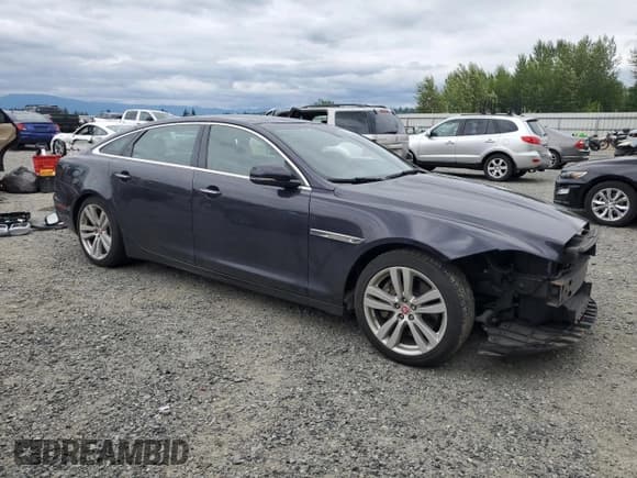 ✅ 2016 Jaguar XJ Portfolio • VIN: SAJWJ2GDXG8V93228 • Lot: 62832115. Listed on Copart with 45,536 mi. Free auction sales archive from the USA and detailed vehicle history report at DreamBid. Image 4.