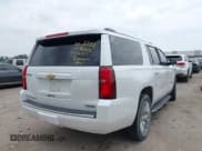 ✅ 2018 Chevrolet Suburban Premier • VIN: 1GNSKJKC2JR378793 • Lot: 42327679. Listed on IAAI with 151,091 mi. Free auction sales archive from the USA and detailed vehicle history report at DreamBid. Image 4.