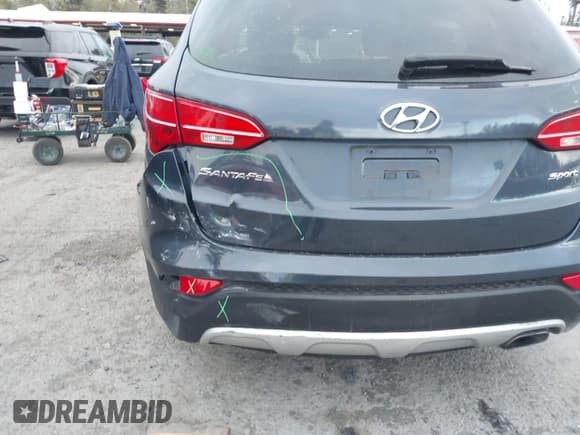 ✅ 2013 Hyundai Santa Fe Sport • VIN: 5XYZU3LB8DG087690 • Лот: 43492682. Опубликован ранее на IAAI с пробегом 124 249 миль. Бесплатный доступ к архиву аукционных продаж из США и подробный отчёт об истории автомобиля на DreamBid. Изображение 13.