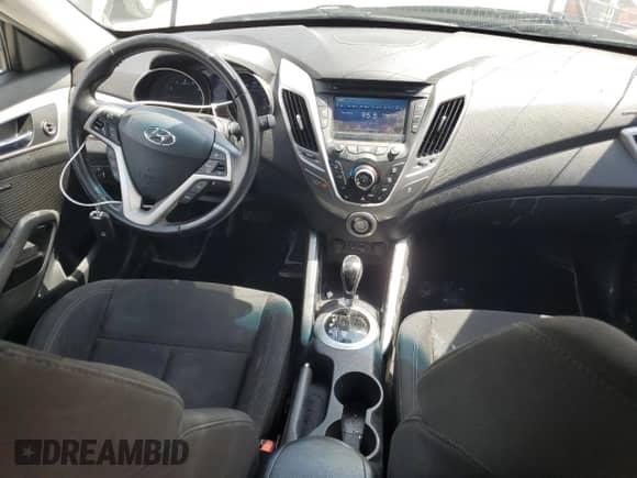 2013 Hyundai Veloster w/Gray Int z VIN KMHTC6AD0DU156798, wystawiony jako Copart lot #64678554 z przebiegiem 119 578 mil mil oraz Szkoda całkowita • Salvage title. Historia ofert i sprzedaży dostępna na DreamBid. Obrazek 8.