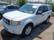 ✅ 2008 Ford Escape Hybrid • VIN: 1FMCU49H48KC64156 • Lot: 42978587. Listed on IAAI with 119,157 mi. Free auction sales archive from the USA and detailed vehicle history report at DreamBid. Image 2.