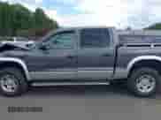 2002 Dodge Dakota SLT с VIN 1B7HG48N02S519241, выставлен на аукционе IAAI как лот 43121163 с пробегом 102 842 миль миль и . История ставок и продаж доступна на DreamBid. Изображение 14.