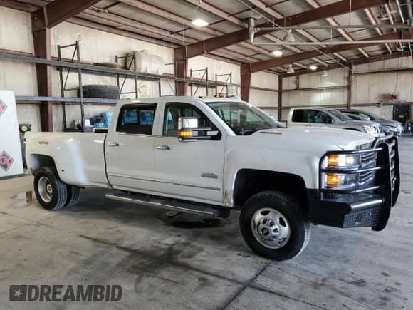 2016 Chevrolet Silverado 3500HD High Country с VIN 1GC4K1E8XGF300605, выставлен на аукционе Copart как лот 62260115 с пробегом 138 551 миль миль и Списание • Salvage title. История ставок и продаж доступна на DreamBid. Изображение 4.