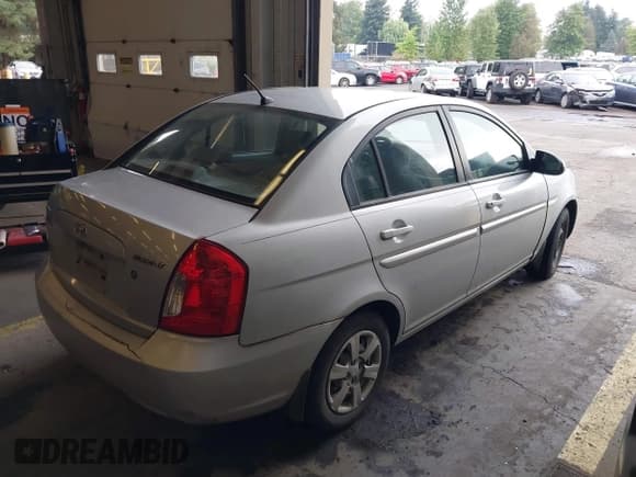 ✅ 2007 Hyundai Accent GLS • VIN: KMHCN46C87U088804 • Лот: 40425051. Опубликован ранее на IAAI с пробегом 158 509 миль. Бесплатный доступ к архиву аукционных продаж из США и подробный отчёт об истории автомобиля на DreamBid. Изображение 4.