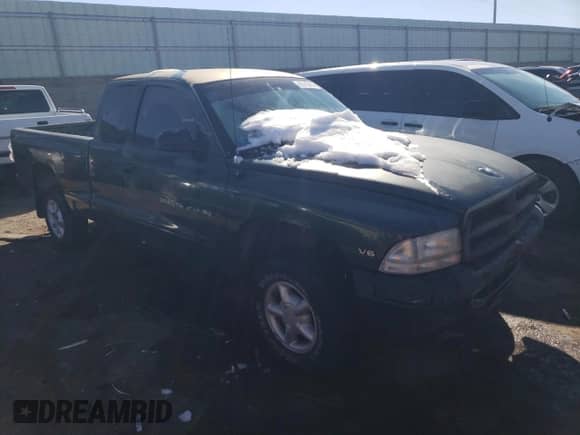 1999 Dodge Dakota SLT z VIN 1B7GG22X0XS239398, wystawiony jako Copart lot #80143414 z przebiegiem 147 646 mil mil oraz Szkoda całkowita • Salvage title. Historia ofert i sprzedaży dostępna na DreamBid. Obrazek 4.