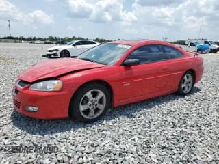 ✅ 2003 Dodge Stratus • VIN: 4B3AG52H73E130994 • Lot: 57826155. Listed on Copart with 94,053 mi. Free auction sales archive from the USA and detailed vehicle history report at DreamBid. Image 1.