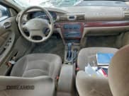 ✅ 2003 Chrysler Sebring LXi • VIN: 1C3EL56T93N594689 • Lot: 93358805. Listed on Copart with 182,501 mi. Free auction sales archive from the USA and detailed vehicle history report at DreamBid. Image 8.