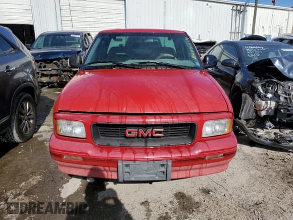 ✅ 1997 GMC Sonoma SLS • VIN: 1GTCS19XXVK506122 • Lot: 82875544. Wystawiony na Copart z przebiegiem 148 914 mil. Bezpłatny archiwum sprzedaży aukcyjnych z USA i szczegółowy raport historii pojazdu na DreamBid. Zdjęcie 5.