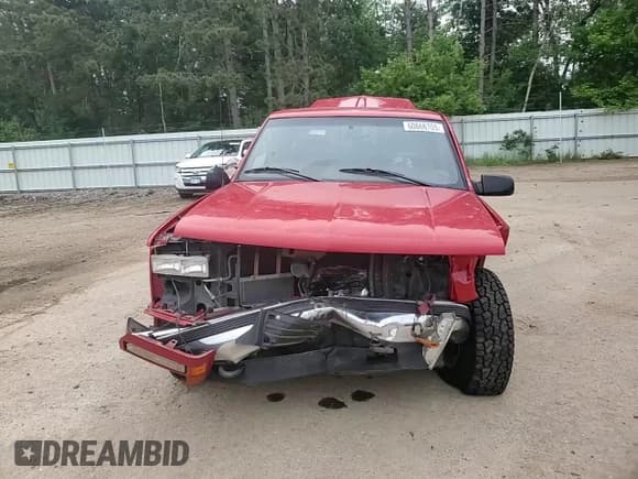 ✅ 1998 GMC Sierra 1500 • VIN: 2GTEK19RXW1547233 • Лот: 60666705. Опубликован ранее на Copart с пробегом 168 373 миль. Бесплатный доступ к архиву аукционных продаж из США и подробный отчёт об истории автомобиля на DreamBid. Изображение 13.