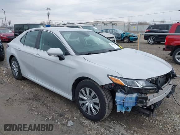 2023 Toyota Camry Hybrid LE with VIN 4T1C31AK8PU052114, listed as a IAAI auction lot 41982736 with 81,059 mi miles and . Bid and sale history available at DreamBid. Image 1.
