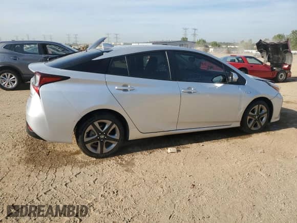 2021 Toyota Prius L Eco с VIN JTDKAMFU1M3138206, выставлен на аукционе Copart как лот 80360175 с пробегом 67 910 миль миль и Списание • Salvage title. История ставок и продаж доступна на DreamBid. Изображение 3.