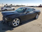 ✅ 2012 Dodge Challenger R/T Plus • VIN: 2C3CDYBT1CH186742 • Lot: 76144944. Wystawiony na Copart z przebiegiem 198 600 mil. Bezpłatny archiwum sprzedaży aukcyjnych z USA i szczegółowy raport historii pojazdu na DreamBid. Zdjęcie 1.