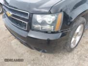 ✅ 2014 Chevrolet Tahoe LT • VIN: 1GNSCBE04ER141927 • Lot: 42651845. Listed on IAAI with 89,980 mi. Free auction sales archive from the USA and detailed vehicle history report at DreamBid. Image 18.