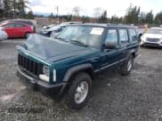 ✅ 1998 Jeep Cherokee Sport • VIN: 1J4FJ68S1WL251692 • Lot: 41798145. Listed on IAAI with 133,600 mi. Free auction sales archive from the USA and detailed vehicle history report at DreamBid. Image 2.