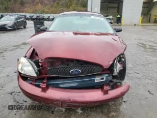 ✅ 2007 Ford Taurus SE • VIN: 1FAFP53UX7A114230 • Lot: 90257085. Wystawiony na Copart z przebiegiem Nie podano. Bezpłatny archiwum sprzedaży aukcyjnych z USA i szczegółowy raport historii pojazdu na DreamBid. Zdjęcie 5.